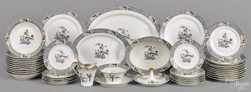 Haviland Limoges dinner service, 20th c., approximately fifty pieces, in the Rajah pattern.