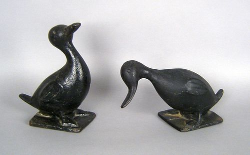 Two cast iron duck yard ornaments, 20th c., talles