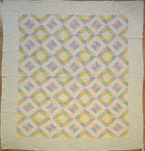 Pieced diamond pattern quilt, 91" x 79".
