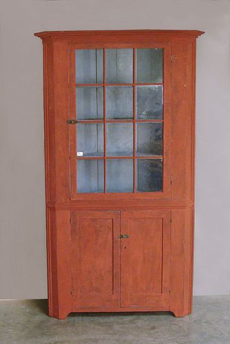 Red painted one piece corner cupboard, 19th c., 82