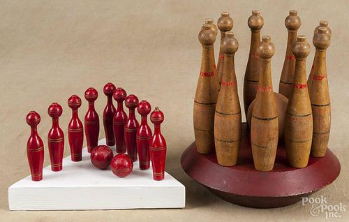 Set of painted red skittles, 20th c., 5'' h., together with a set of small bowling pins