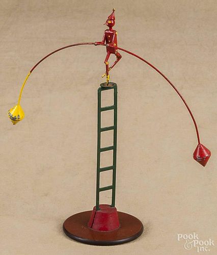 Painted tin and steel balance toy, 20th c., 10'' h.