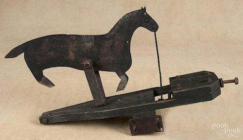 Painted sheet iron horse whirligig fragment, late 19th c., 20'' l.