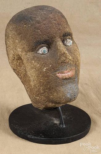 Carved sandstone painted head, 19th c., with painted accents, 10 1/2'' h.