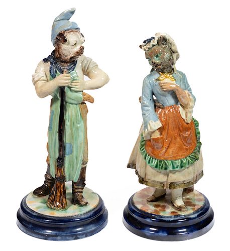 CONTINENTAL STAFFORDSHIRE-STYLE HAND-PAINTED CERAMIC ANTHROPOMORPHIC CAT AND DOG FIGURAL PAIR