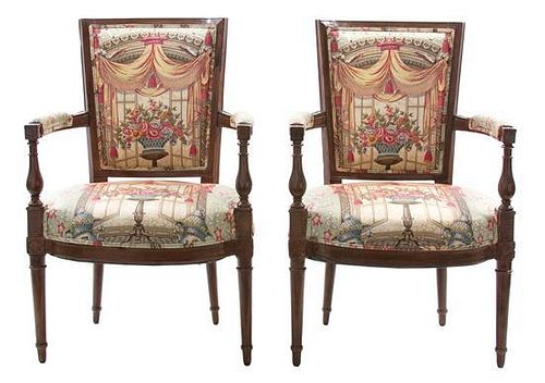 A Pair of Louis XVI Style Carved Fruitwood and Upholstered Fautueils Height 35 x width 22 x depth 18 inches.