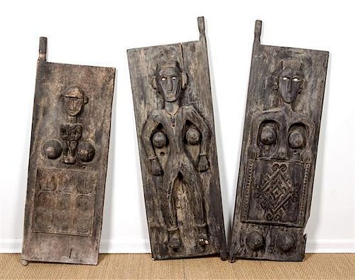 Three Indonesian Carved Wood Door Panels, Height of each 60 x width 18 1/2 inches.