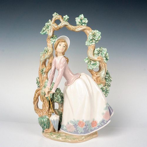 Girl Standing Under Trellis 1005297 - Lladro Porcelain Figurine