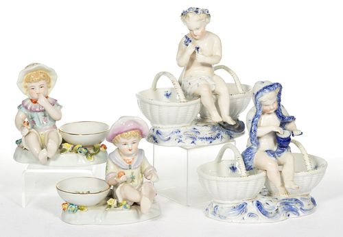 GERMAN HAND-PAINTED PORCELAIN FIGURAL CHILDREN OPEN SALT PAIRS, LOT OF TWO