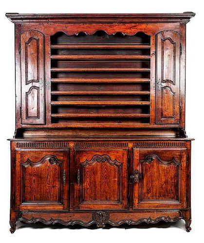 A French Provincial Stepback Cupboard, Height 97 x width 82 x 21 inches.