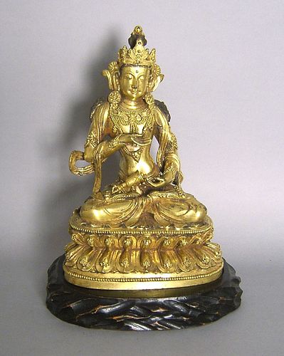 Tibetan bronze religious figure, 9 1/4" h.