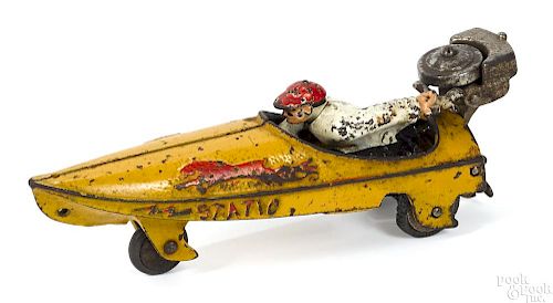 Hubley cast iron Static speed boat with a seated driver and outboard motor, 9 3/4'' l.