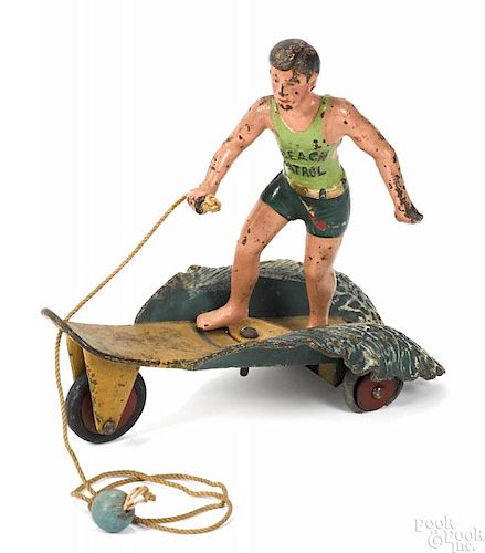 Hubley cast iron ''Surfer Boy'' pull toy, retaining the original Jantzen and Hubley decals
