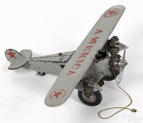 Hubley cast iron tri-motor America airplane with two pilots, aluminum wing