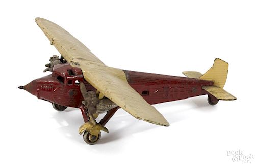 Kilgore cast iron TAT tri-motor airplane with nickel-plated propellers, 13 1/2'' wingspan.
