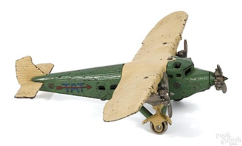 Kilgore cast iron TAT tri-motor airplane with nickel-plated propellers, 13 1/2'' wingspan.