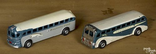 Two Arcade cast iron Greyhound Lines buses, 9'' l.