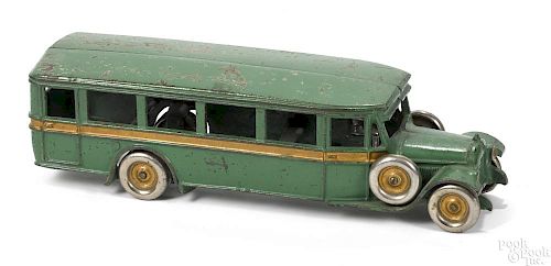 Arcade cast iron parlor coach bus with a nickel-plated driver and tires, 13'' l.