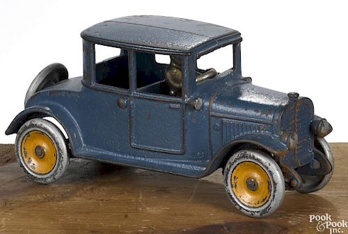 Hubley cast iron coupe with a nickel-plated driver and painted wheels, 9'' l.