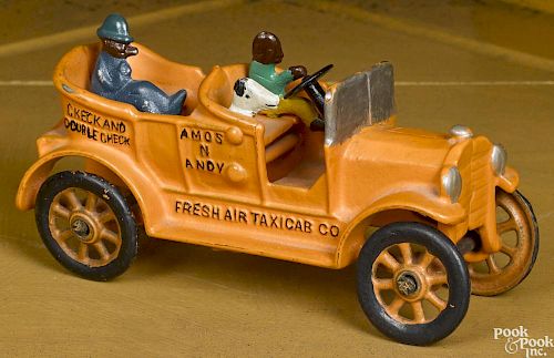 Dent cast iron Amos n Andy Fresh Air Taxicab Co. with a painted driver, a passenger, and a dog