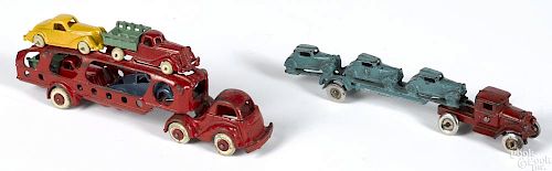 Two cast iron Hubley car carriers, to include a cab over engine truck with four cars, 10'' l.