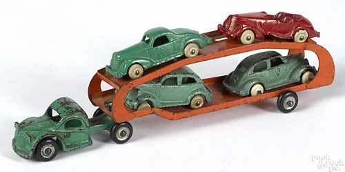 Arcade cast iron car carrier, steel trailer with four cars, 11 1/4'' l.