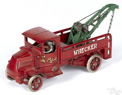 Arcade cast iron Mack wrecker truck with a nickel-plated driver, 12 1/2'' l.