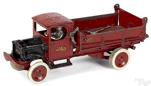 Arcade cast iron White dump truck with a nickel-plated driver