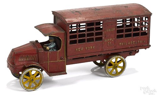 Dent cast iron Junior Supply Co. New York - Philadelphia delivery truck with a painted driver