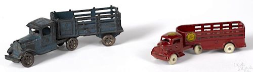 Two cast iron stake back trailer trucks, to include an A.C. Williams Coast to Coast Cartage Co.