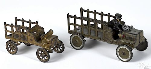Kenton cast iron embossed Army Motor Truck with a driver, 9'' l., together with a smaller version