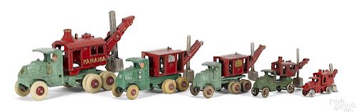 Five Hubley graduated cast iron steam shovel trucks with nickel-plated buckets