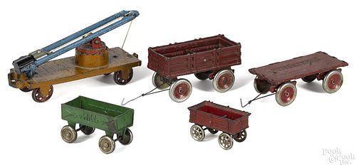 Four cast iron farm wagons, to include Arcade and Kenton, longest - 6 3/4''