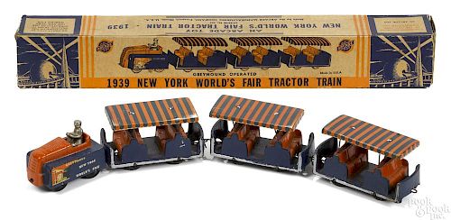 Arcade cast iron New York World's Fair Tractor Train - 1939, with original box, 16'' l.
