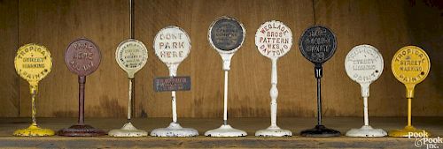 Nine cast iron advertising traffic road signs, to include Standard Foundry Company