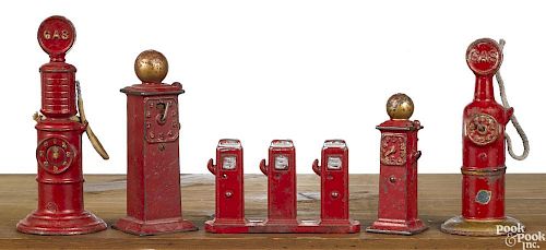 Five Arcade cast iron gas pumps, in various styles, tallest - 6 1/4''.