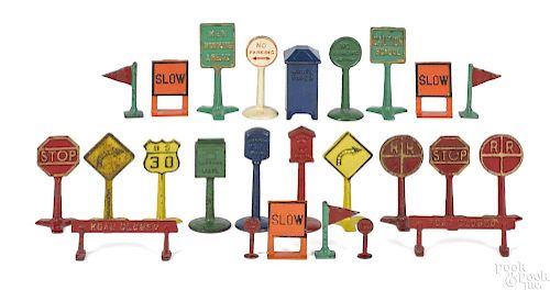 Twenty-five cast iron road signs and mail boxes, to include Arcade and Kilgore, etc.