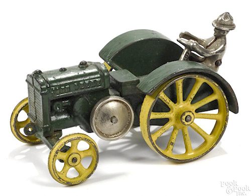 Vindex cast iron John Deere ''D'' tractor with a nickel-plated driver, 6 1/2'' l.