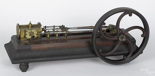 Brass and iron steam engine model, 19th c., on a footed wood base, fully functional