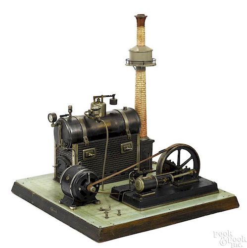 Bing steam plant with dynamo and a single cylinder engine mounted on a decorated tin and wood base