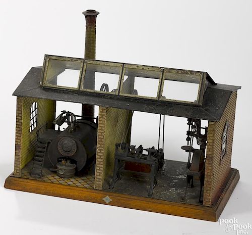 Scarce Bing steam powered workshop, constructed of embossed painted and lithographed tin
