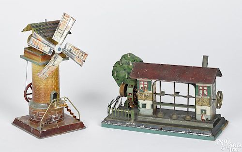 Two tin steam engine accessories, to include a Krauss & Mohr lithograph trip hammer motor house