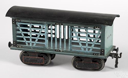 Marklin painted tin P.R.R. livestock train car, gauge 1, with a hinged roof, 10'' l.