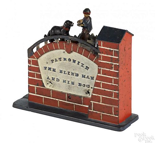 J. & E. Stevens cast iron Patronize the Blind Man and His Dog mechanical bank.