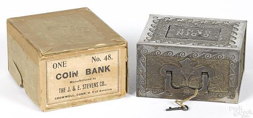 J. & E. Stevens nickel-plated cast iron Coin still bank with the original box, 4 1/4'' h.