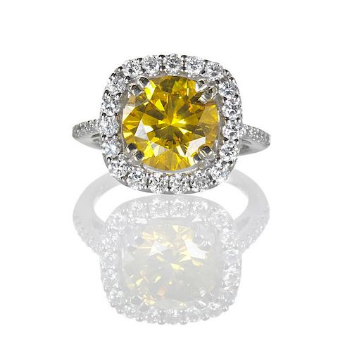 FANCY YELLOW AND COLORLESS DIAMOND RING