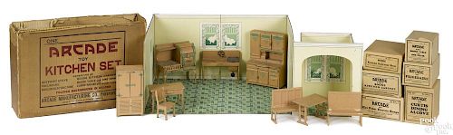 Arcade cast iron nine-piece kitchen suite, some in original boxes, with surround