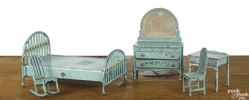Arcade cast iron five-piece bedroom suite, to include a dresser with a mirror, a bed