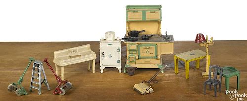 Cast iron doll house furniture and accessories, to include a Kilgore Sally Ann sweeper
