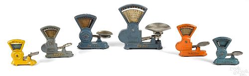 Six Kilgore and Hubley cast iron Toledo and Dayton counter scales, tallest - 6''.